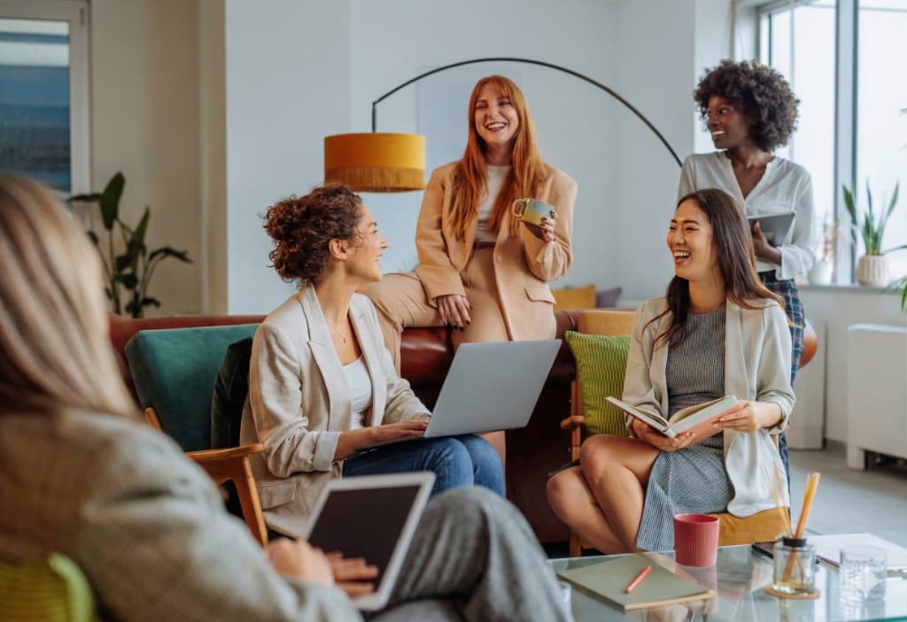 Group of creators collaborating on a brand partnership deal
