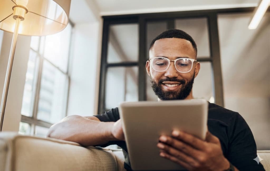 Creator reviewing their revenue and deal status on a tablet
